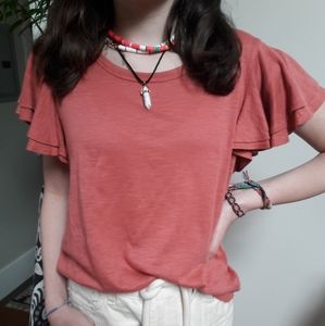 Coral pink  frilly t shirt.